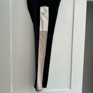Women’s medium (fits like a small) Move Theology yoga pants.